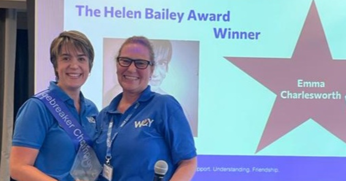 Trustee Jo presents WAY Ambassador Emma C with Helen Bailey Award